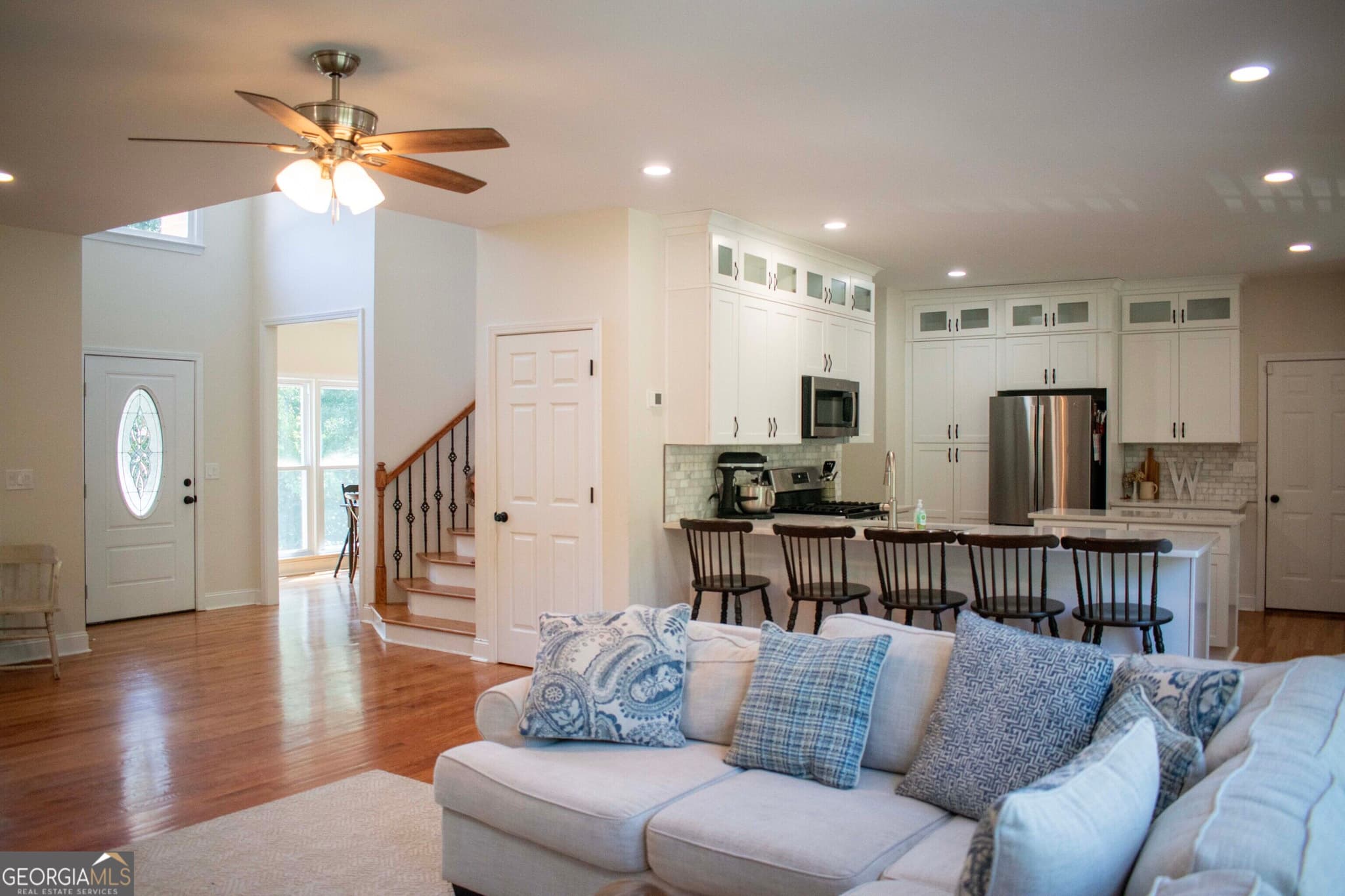 5 bedroom, 3.5 bathroom, 3,425 sq ft single family residence for sale at 2735 Hanson Court, Cumming, GA 30041 — photo 6