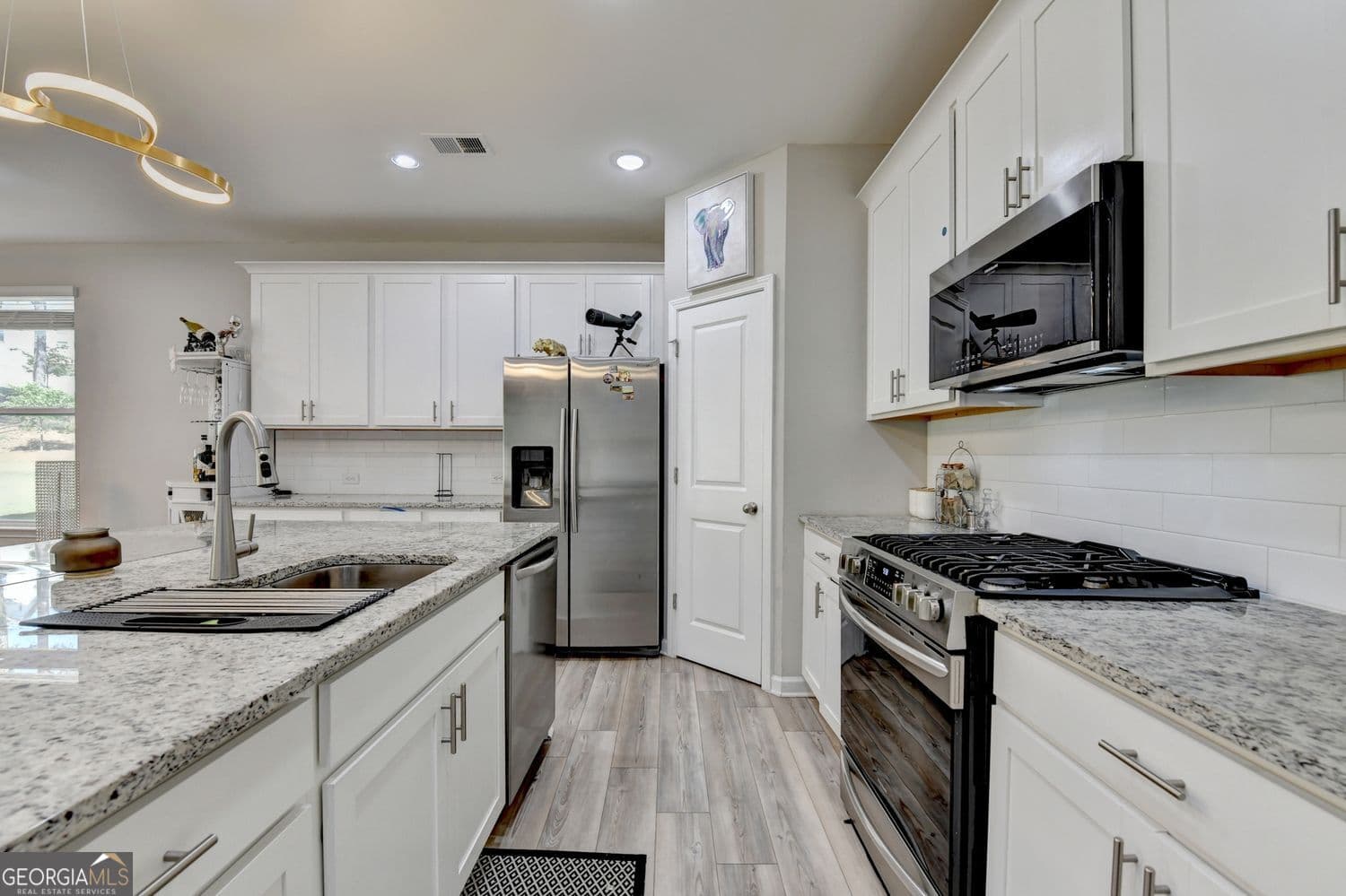 4 bedroom, 2.5 bathroom, 2,309 sq ft single family residence for sale at 3240 Herald Drive, Scottdale, GA 30079 — photo 8
