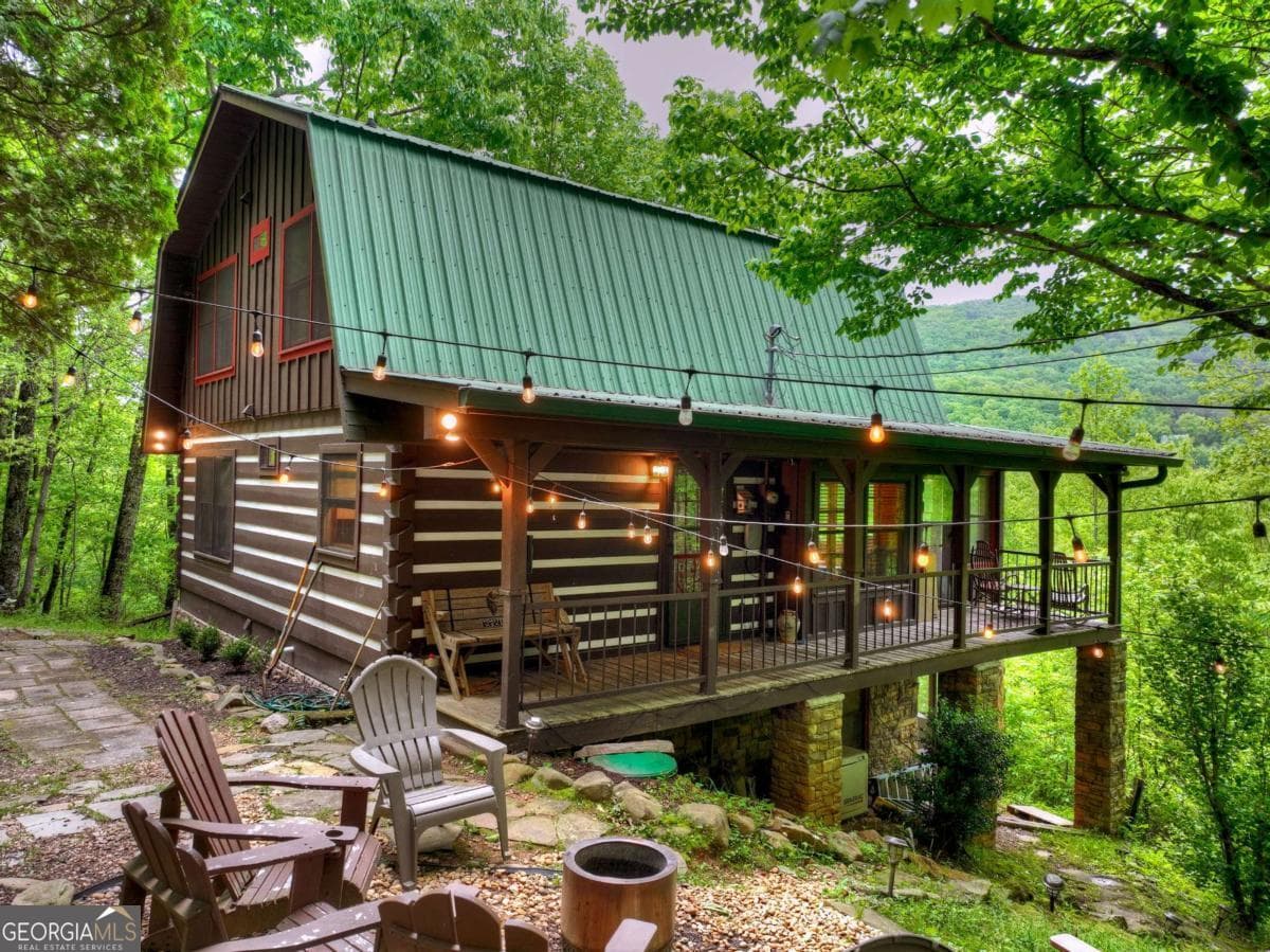 4 bedroom, 3 bathroom, 2,056 sq ft cabin,single family residence for sale at 1582 Little Rock Creek Road, Cherry Log, GA 30522
