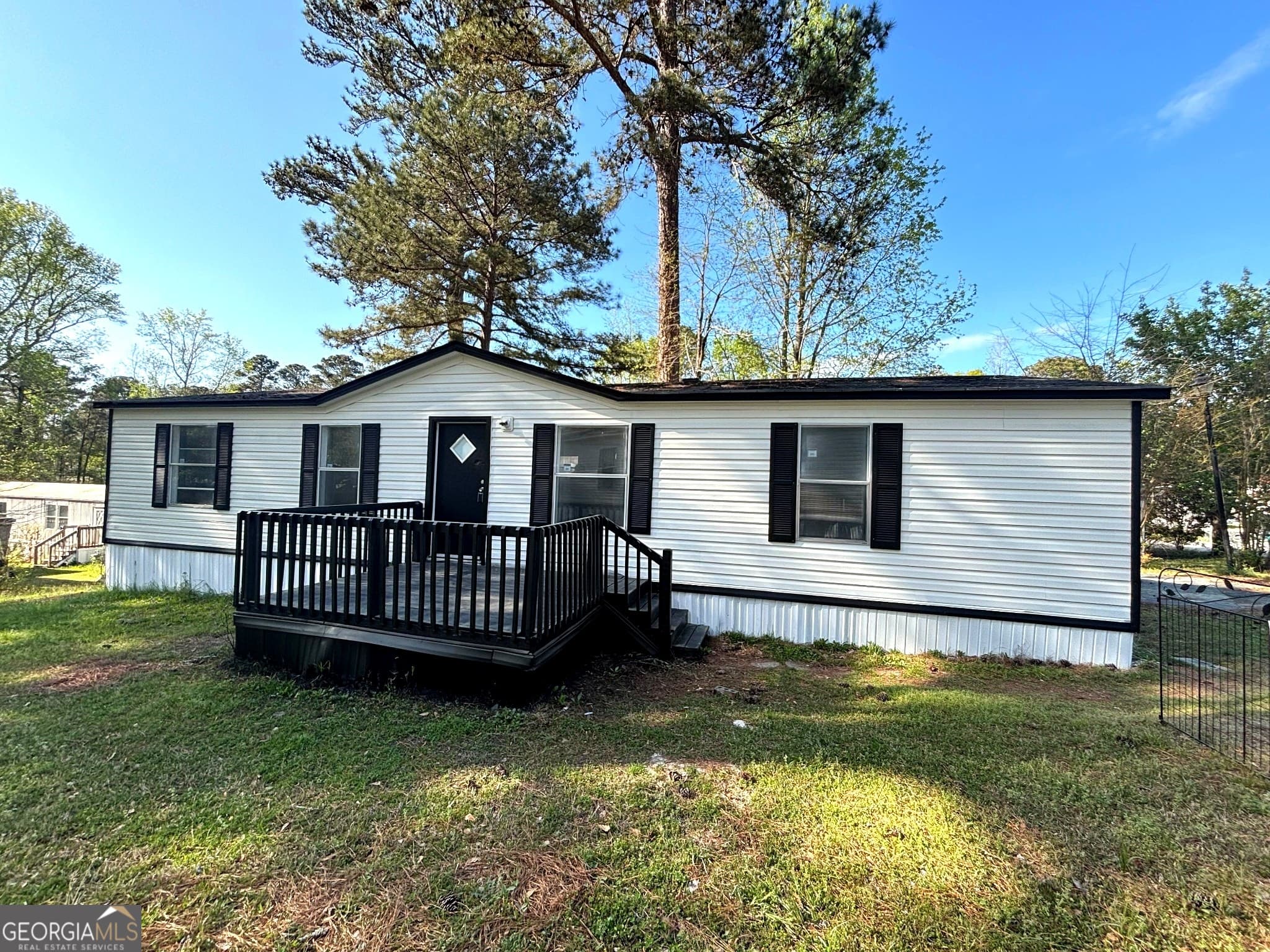 3 bedroom, 2 bathroom, 1,600 sq ft manufactured home,single family residence for sale at 479 Windsor Parkway, Hampton, GA 30228