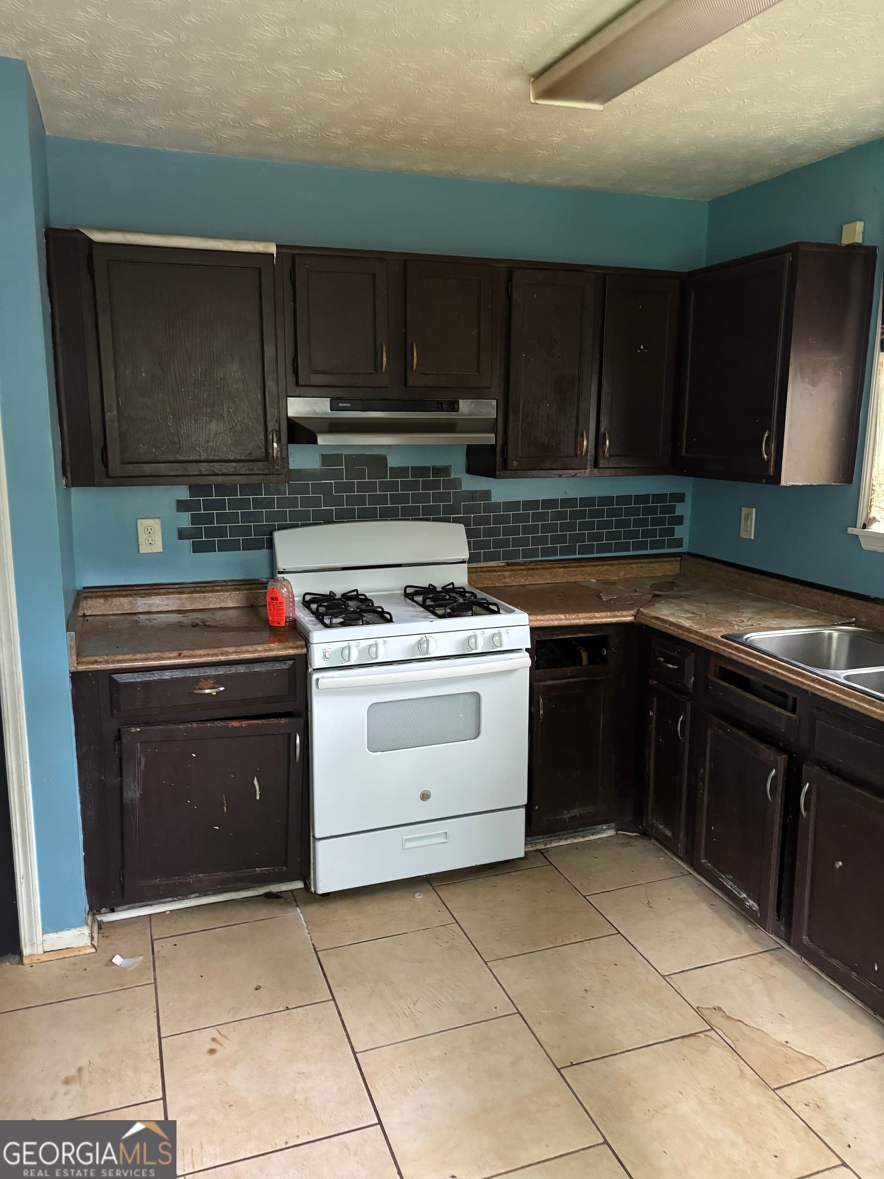 4 bedroom, 2 bathroom single family residence for sale at 1036 Mainstreet Lake Drive, Stone Mountain, GA 30088 — photo 6