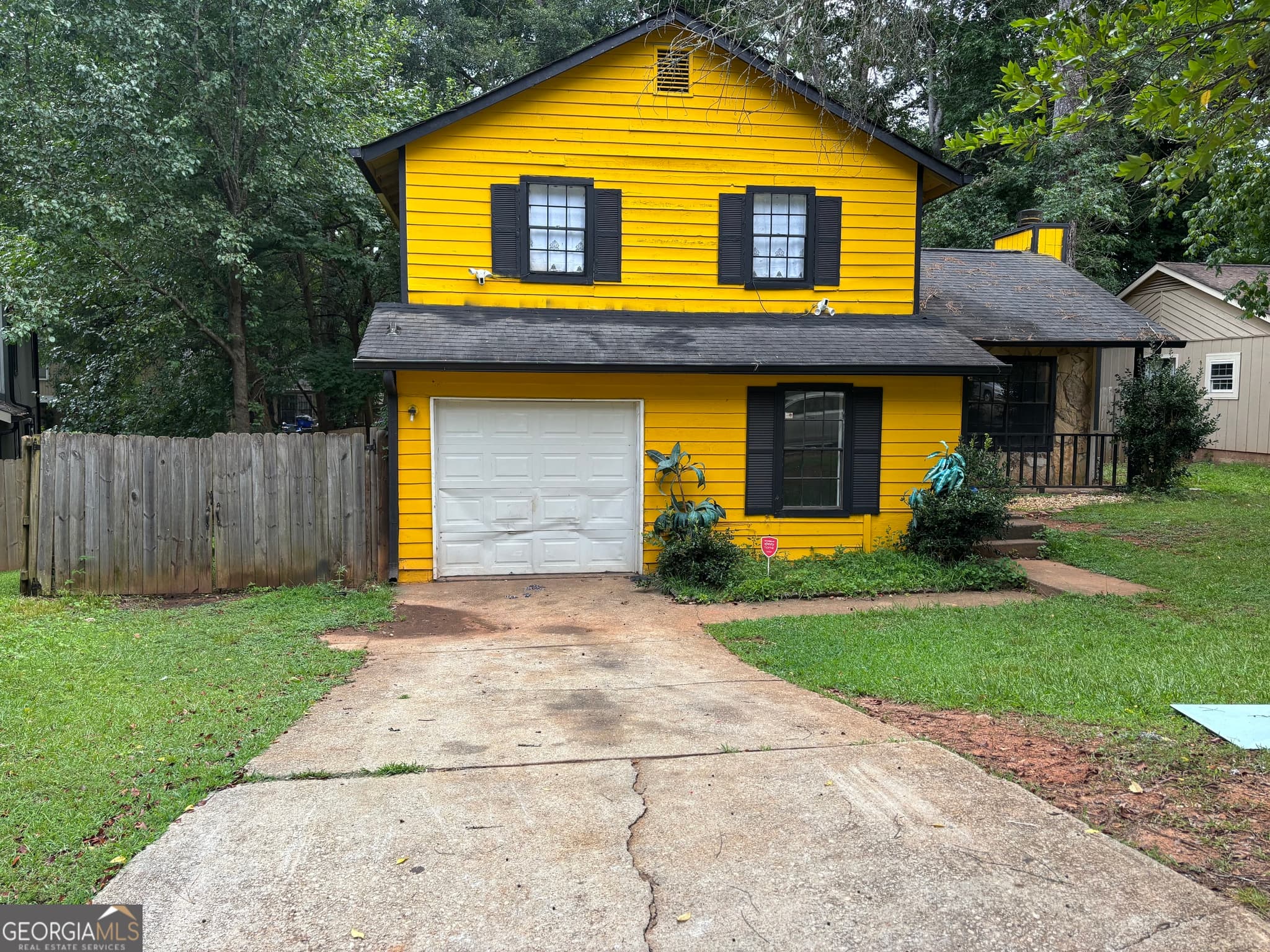 4 bedroom, 2 bathroom single family residence for sale at 1036 Mainstreet Lake Drive, Stone Mountain, GA 30088