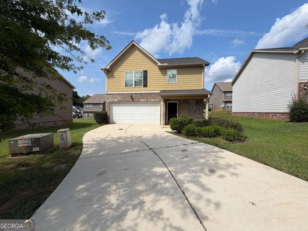 3 bedroom, 2.5 bathroom, 1,750 sq ft single family residence for rent at 313 Nutwood Trace, Locust Grove, GA 30248 for $1,950 a month