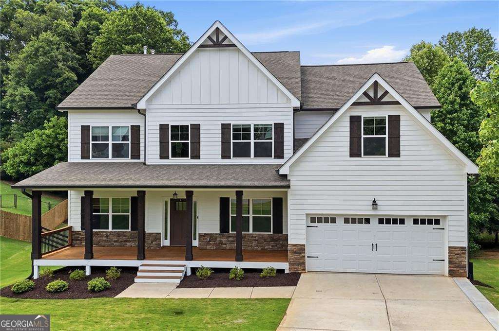 4 bedroom, 3 bathroom, 3,272 sq ft single family residence sold at 7285 Hedgerose Drive, Cumming, GA 30028
