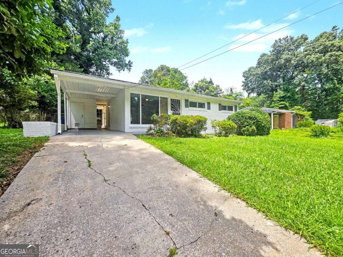 3 bedroom, 2 bathroom, 1,296 sq ft single family residence for sale at 2559 Dale Creek Drive, Atlanta, GA 30318 — photo 6