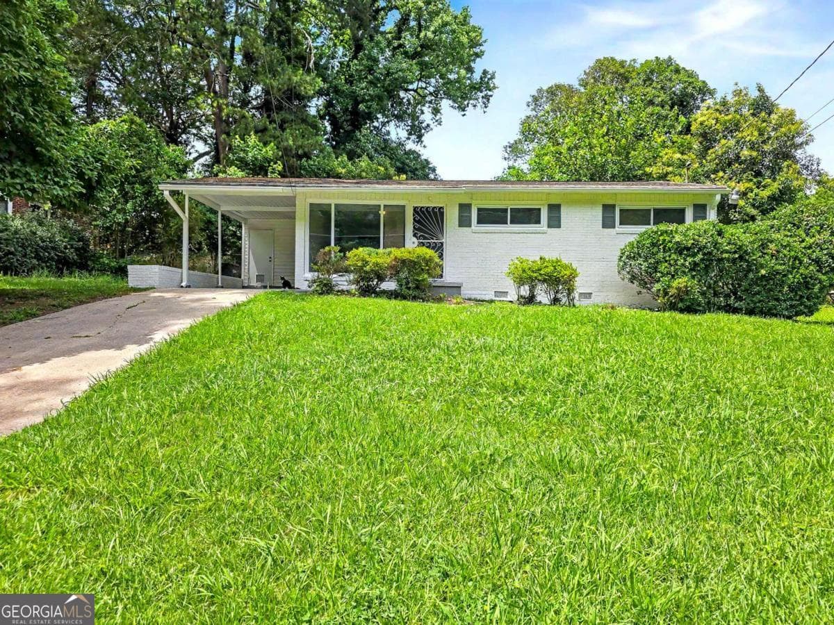 3 bedroom, 2 bathroom, 1,296 sq ft single family residence for sale at 2559 Dale Creek Drive, Atlanta, GA 30318 — photo 3