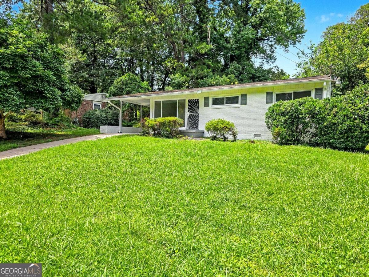 3 bedroom, 2 bathroom, 1,296 sq ft single family residence for sale at 2559 Dale Creek Drive, Atlanta, GA 30318 — photo 5