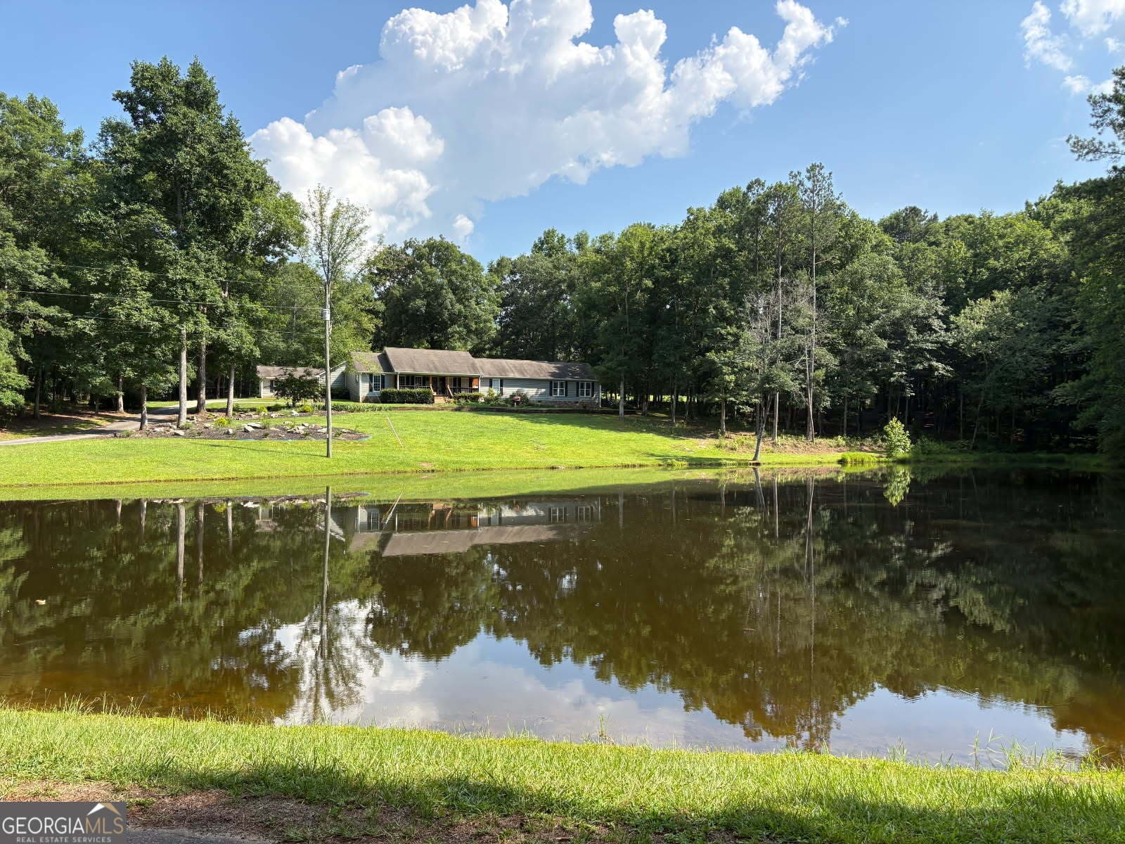 4 bedroom, 3 bathroom, 3,160 sq ft single family residence for sale at 121 Peacock Road, Barnesville, GA 30204 — photo 2