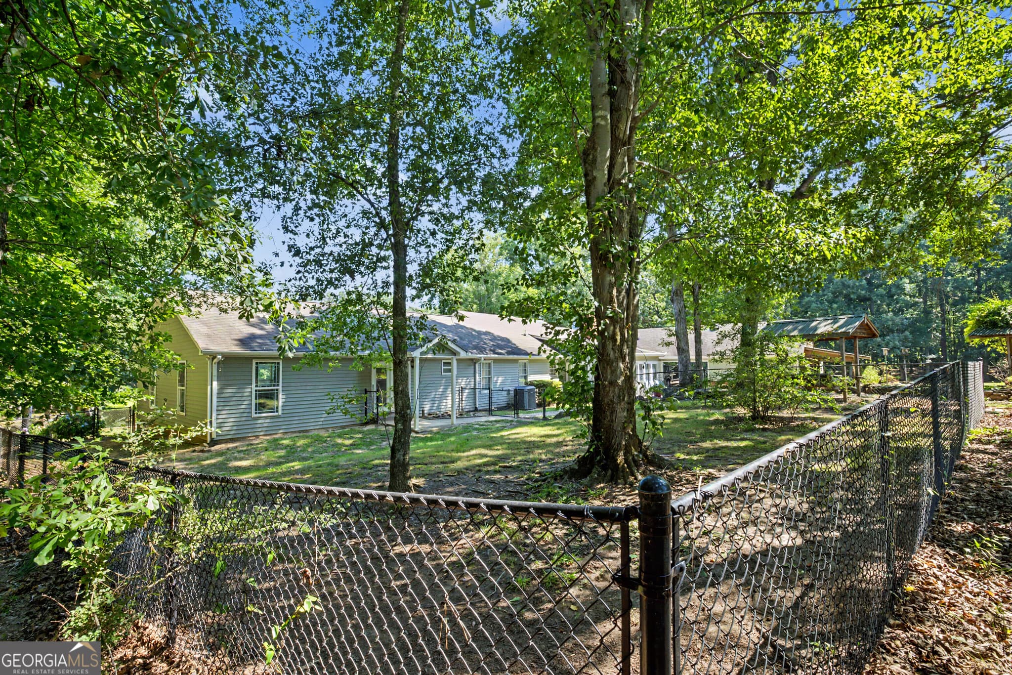 4 bedroom, 3 bathroom, 3,160 sq ft single family residence for sale at 121 Peacock Road, Barnesville, GA 30204 — photo 10