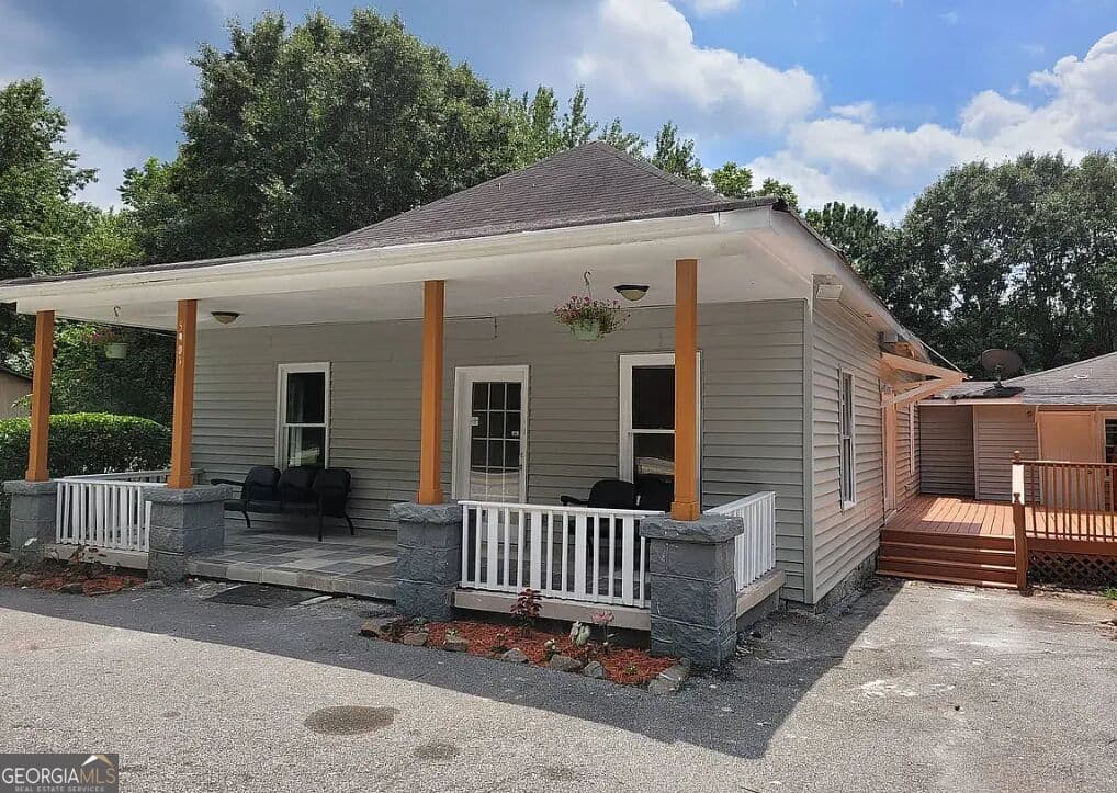 5 bedroom, 2 bathroom, 2,414 sq ft single family residence for rent at 5901 Redan Road, Lithonia, GA 30058 for $2,600 a month — photo 1 of 4
