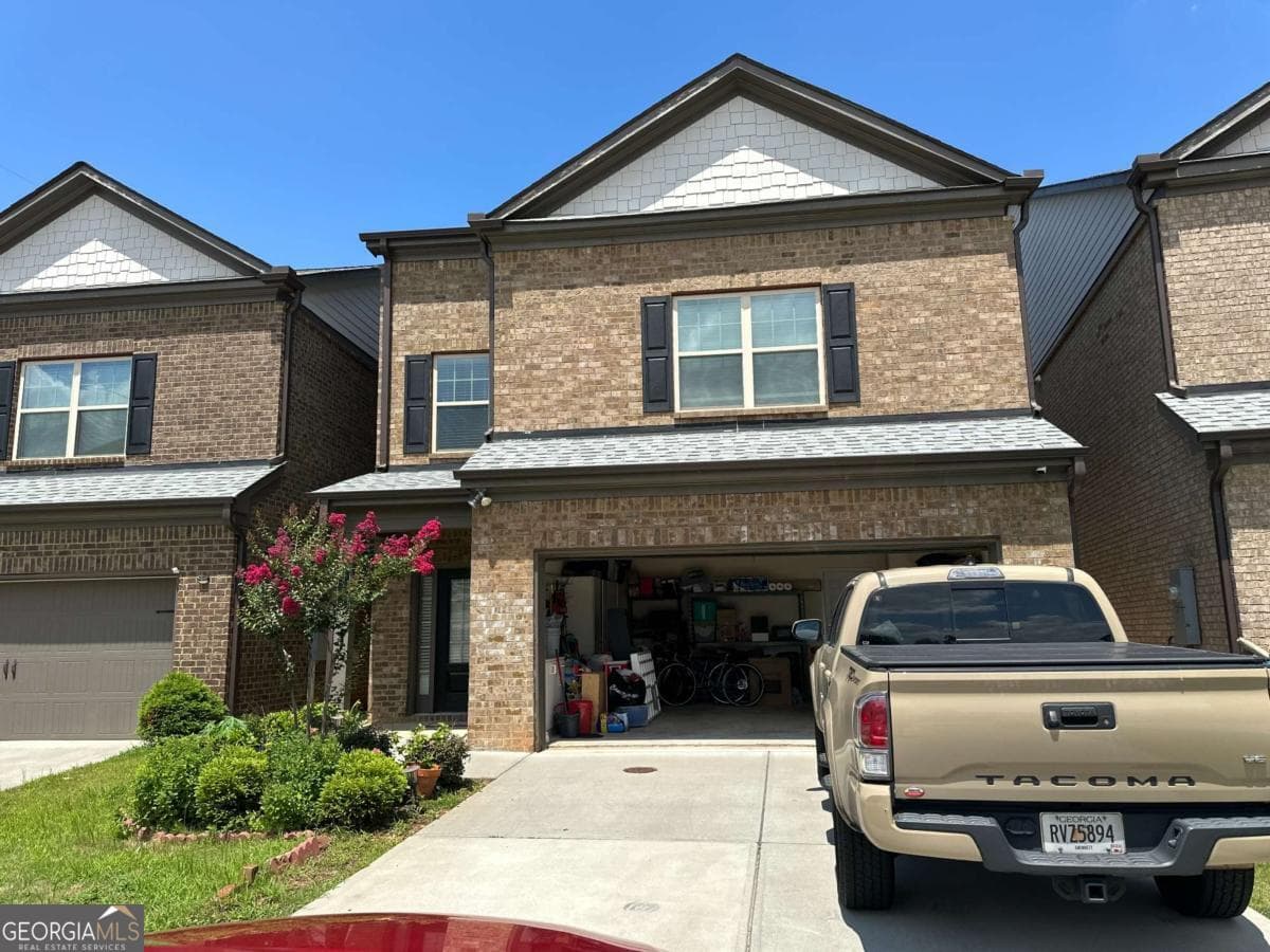 4 bedroom, 3.5 bathroom, 2,288 sq ft single family residence for sale at 4485 Almanor Circle, Norcross, GA 30071 — photo 1 of 11