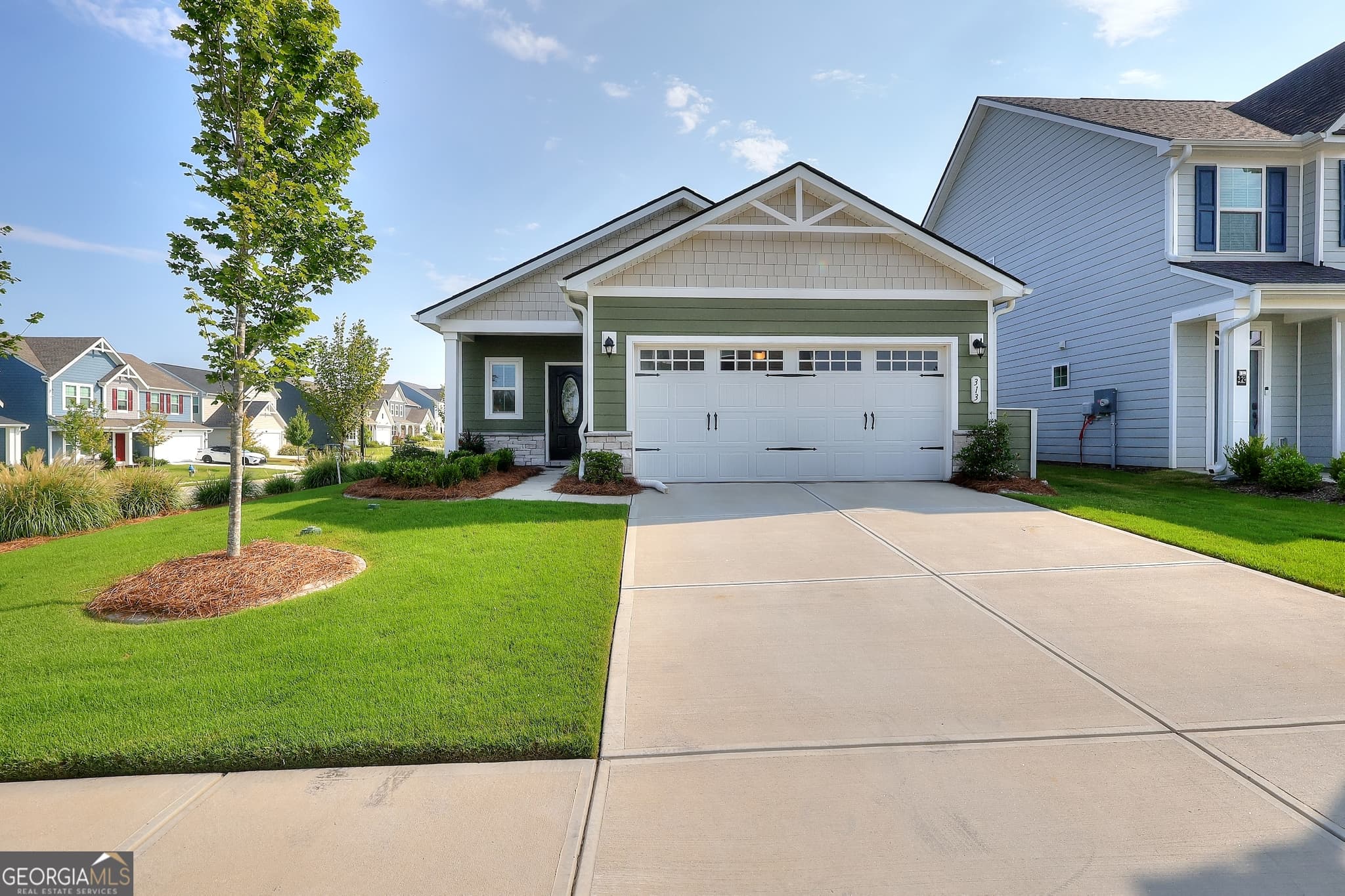 3 bedroom, 2 bathroom, 1,420 sq ft single family residence for sale at 313 Moosehead Trail, Hoschton, GA 30548 — photo 2