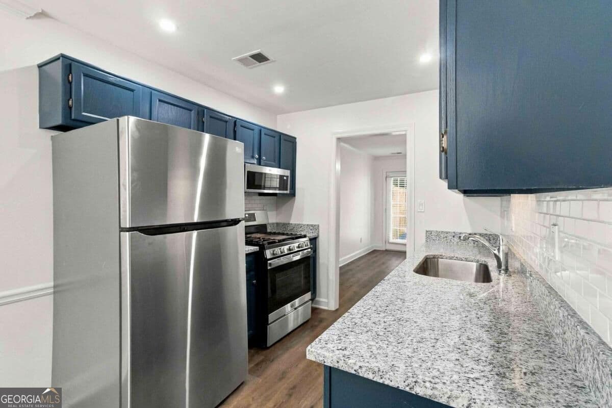 2 bedroom, 2.5 bathroom, 1,212 sq ft townhouse for sale at 1055 Westfield Trace, Smyrna, GA 30082 — photo 2
