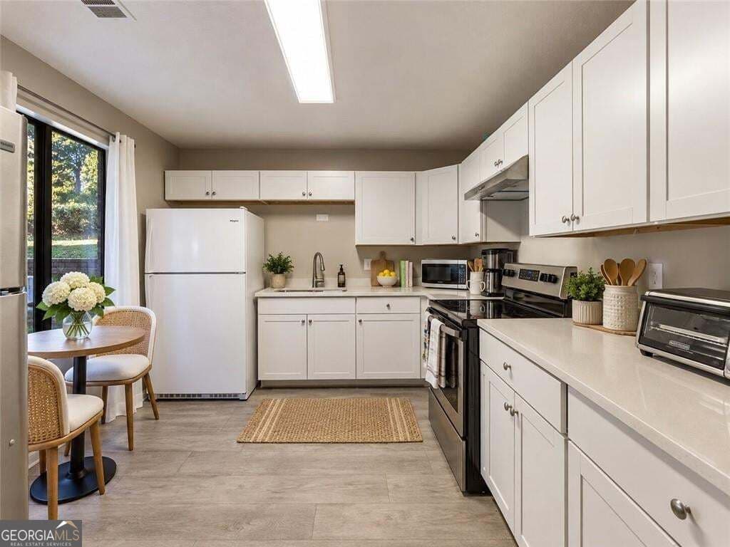 3 bedroom, 2.5 bathroom townhouse for sale at 1265 Jamestowne Trail, Alpharetta, GA 30009 — photo 4