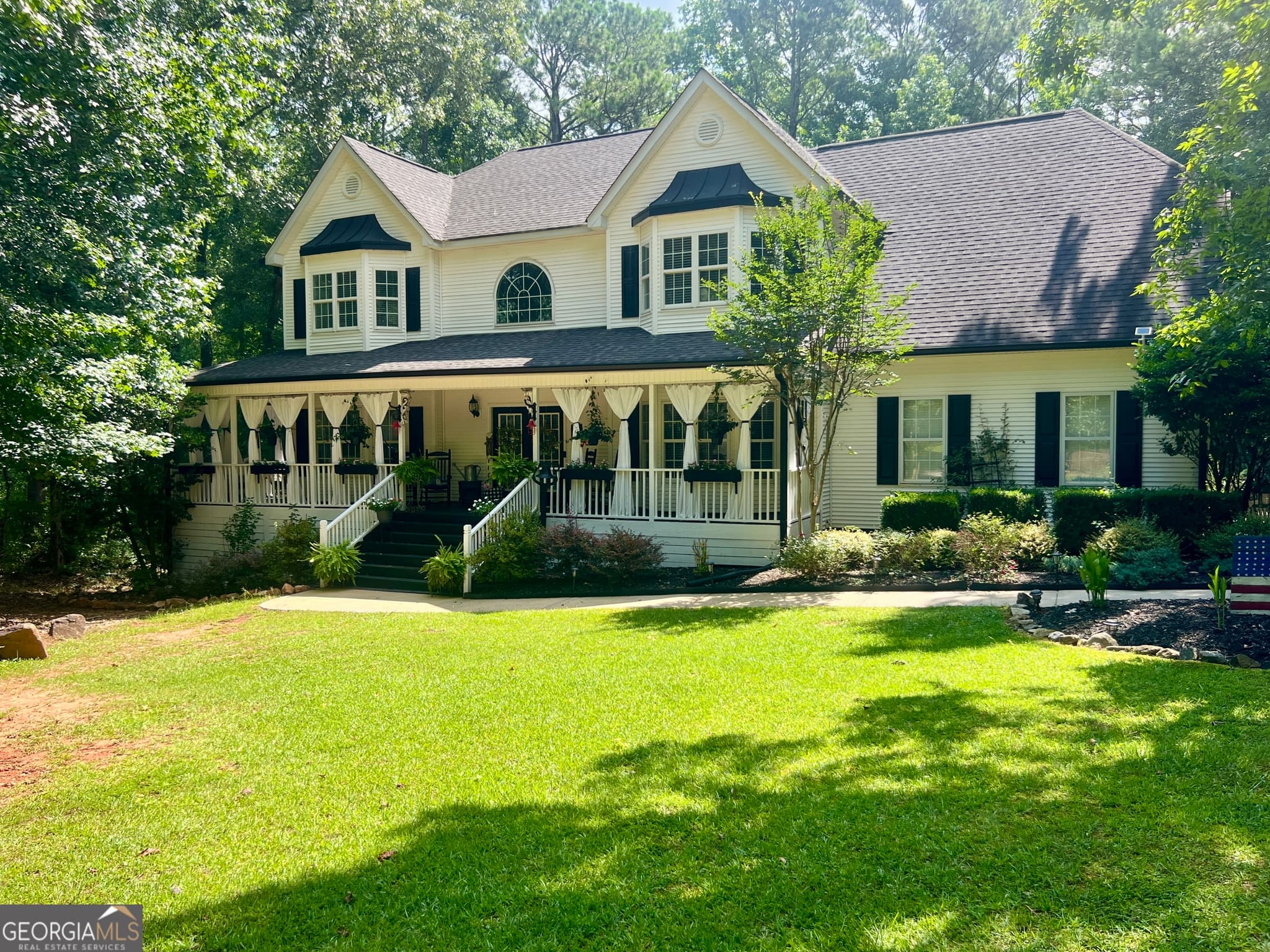 4 bedroom, 4.5 bathroom, 4,566 sq ft single family residence for sale at 385 Minix Road, Sharpsburg, GA 30277 — photo 2
