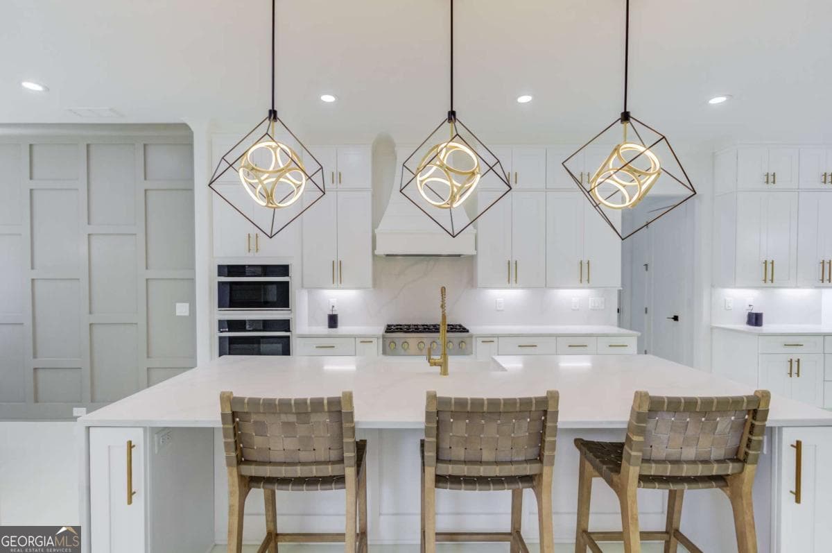 5 bedroom, 4.5 bathroom, 4,804 sq ft single family residence for sale at 961 Nours Circle, Lawrenceville, GA 30045 — photo 7
