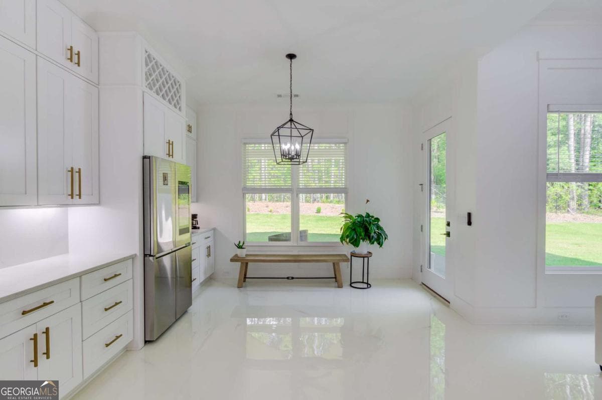 5 bedroom, 4.5 bathroom, 4,804 sq ft single family residence for sale at 961 Nours Circle, Lawrenceville, GA 30045 — photo 9