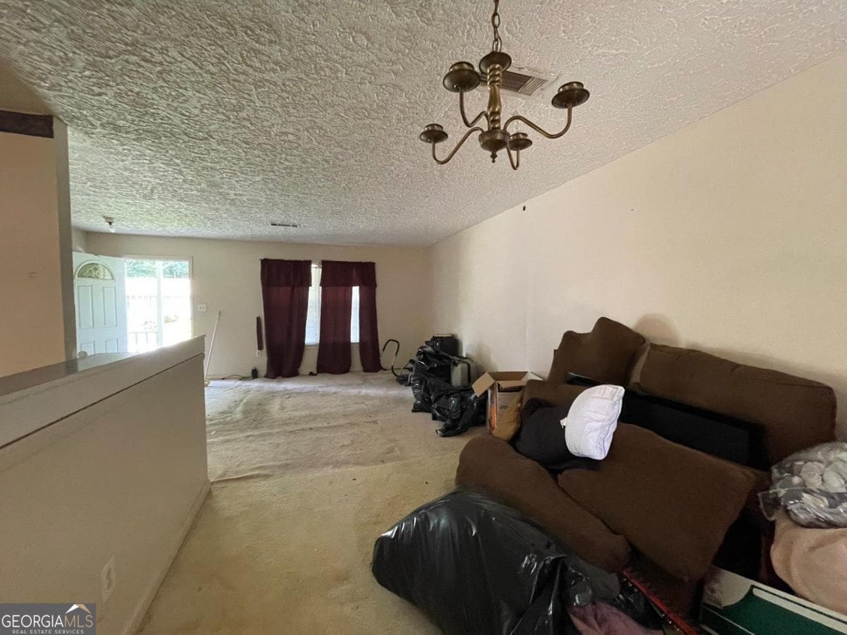 3 bedroom, 2 bathroom, 1,176 sq ft single family residence for sale at 2177 Jonathan Avenue, Lithonia, GA 30058 — photo 2