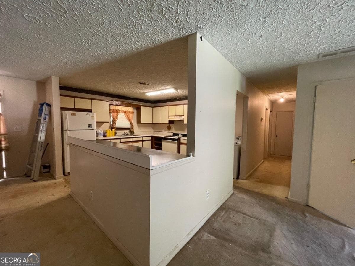 3 bedroom, 2 bathroom, 1,176 sq ft single family residence for sale at 2177 Jonathan Avenue, Lithonia, GA 30058 — photo 3