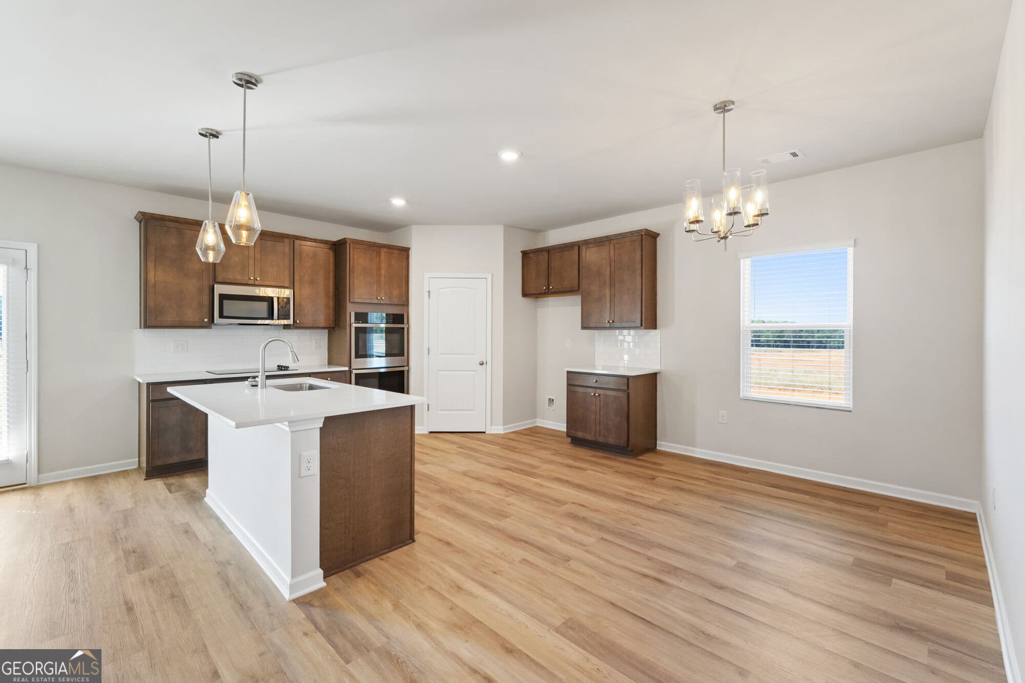 4 bedroom, 3 bathroom, 2,500 sq ft single family residence for sale at 1036 JOYCE Court, Greensboro, GA 30642 — photo 6