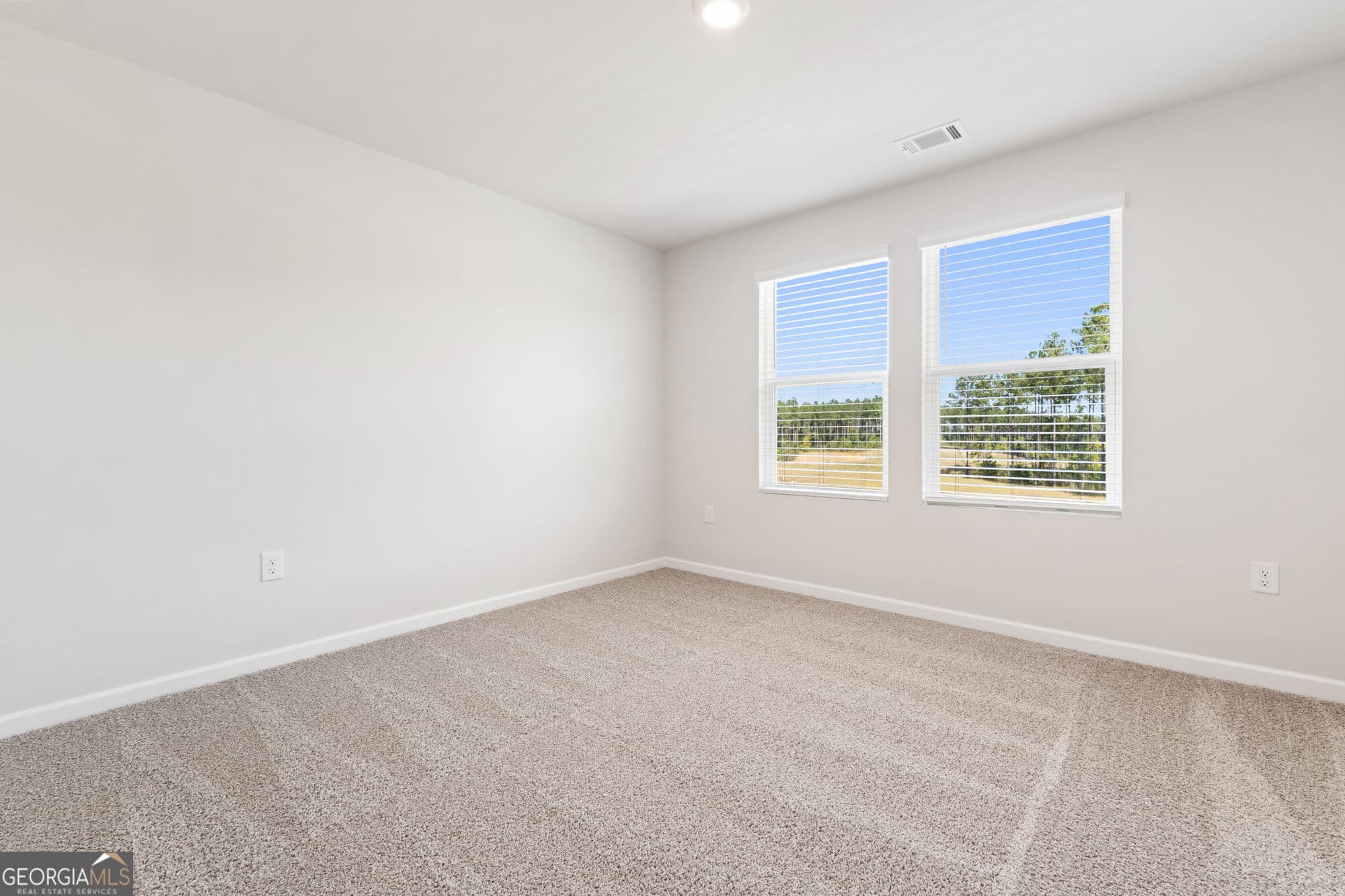 4 bedroom, 3 bathroom, 2,500 sq ft single family residence for sale at 1036 JOYCE Court, Greensboro, GA 30642 — photo 7