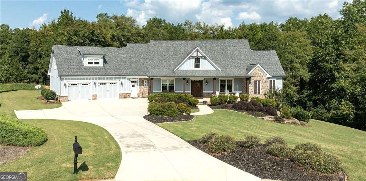 5 bedroom, 4.5 bathroom, 4,592 sq ft single family residence for sale at 617 Skyland Drive, Hoschton, GA 30548 — photo 2