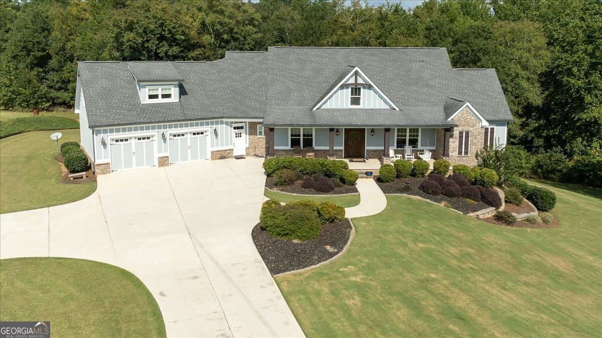5 bedroom, 4.5 bathroom, 4,592 sq ft single family residence for sale at 617 Skyland Drive, Hoschton, GA 30548 — photo 3
