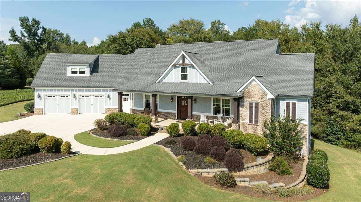 5 bedroom, 4.5 bathroom, 4,592 sq ft single family residence for sale at 617 Skyland Drive, Hoschton, GA 30548 — photo 1 of 50