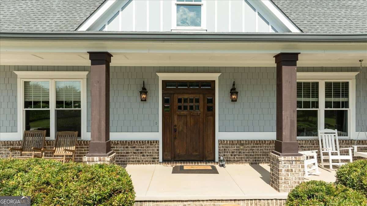 5 bedroom, 4.5 bathroom, 4,592 sq ft single family residence for sale at 617 Skyland Drive, Hoschton, GA 30548 — photo 5