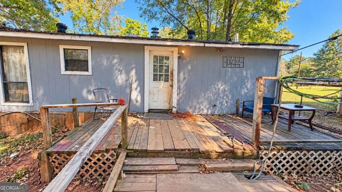 3 bedroom, 1.5 bathroom, 1,350 sq ft manufactured home,single family residence for sale at 115 Skyline Drive, Hampton, GA 30228 — photo 3