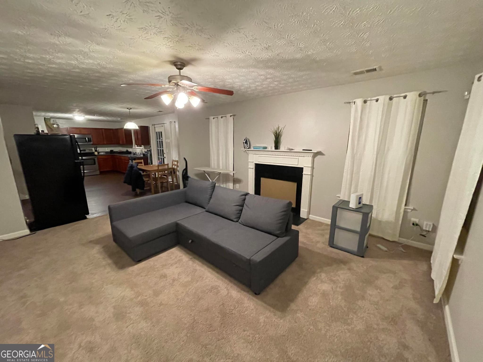 7 bedroom, 4 bathroom, 2,982 sq ft single family residence for sale at 5765 Shoals Place Trail, Atlanta, GA 30349 — photo 5