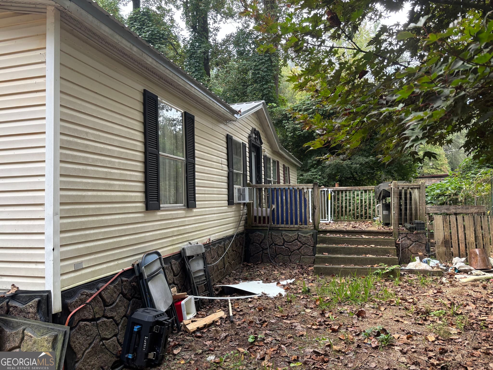 3 bedroom, 2 bathroom, 1,104 sq ft manufactured home,single family residence for sale at 59 Blacks Creek Drive, Clayton, GA 30525 — photo 1 of 20