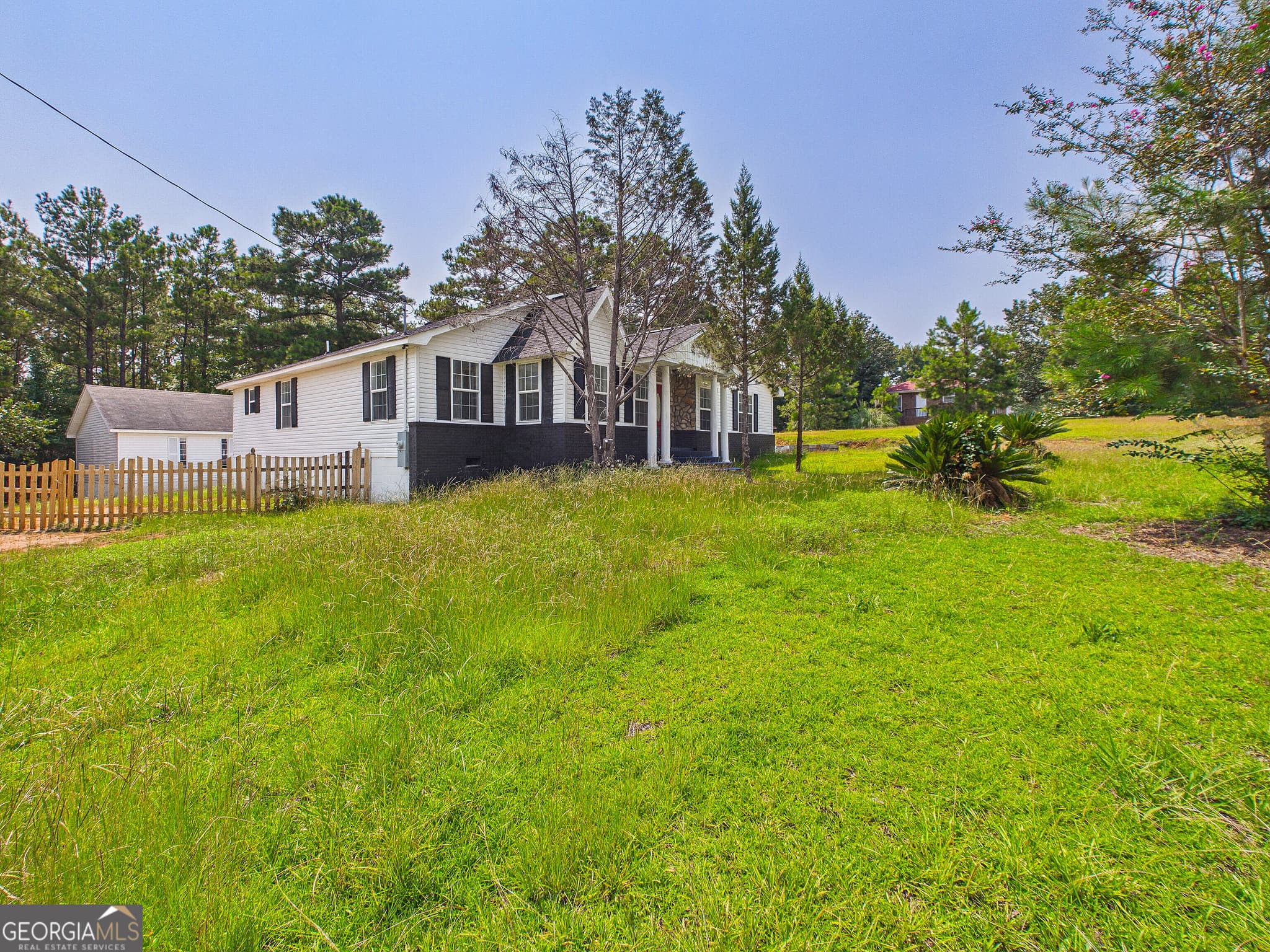 5 bedroom, 4.5 bathroom, 2,186 sq ft single family residence for sale at 153 Wheehaw Road, Macon, GA 31211 — photo 3