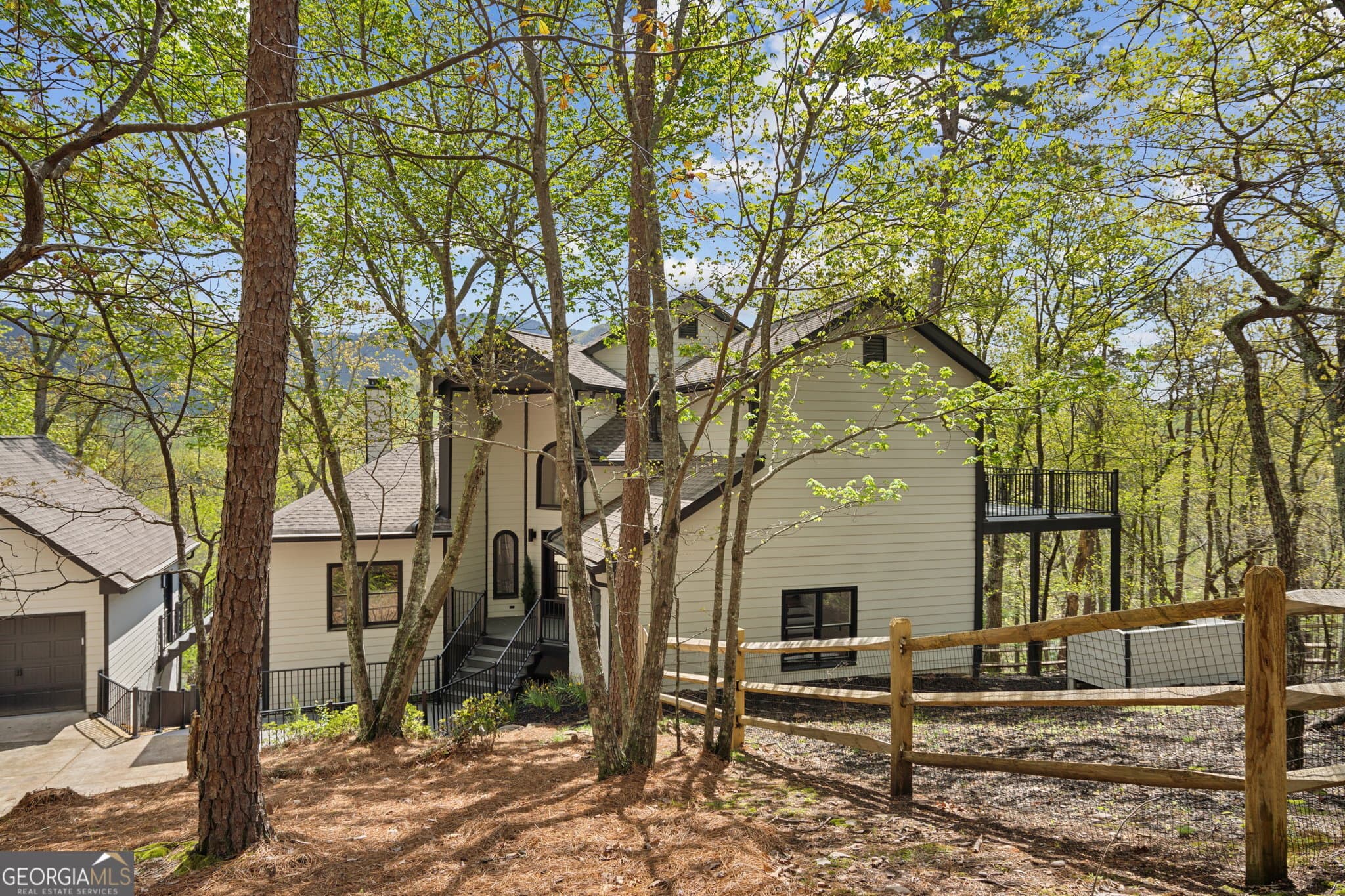 4 bedroom, 3.5 bathroom, 4,516 sq ft single family residence for sale at 2020 Tamarack Drive, Jasper, GA 30143 — photo 2