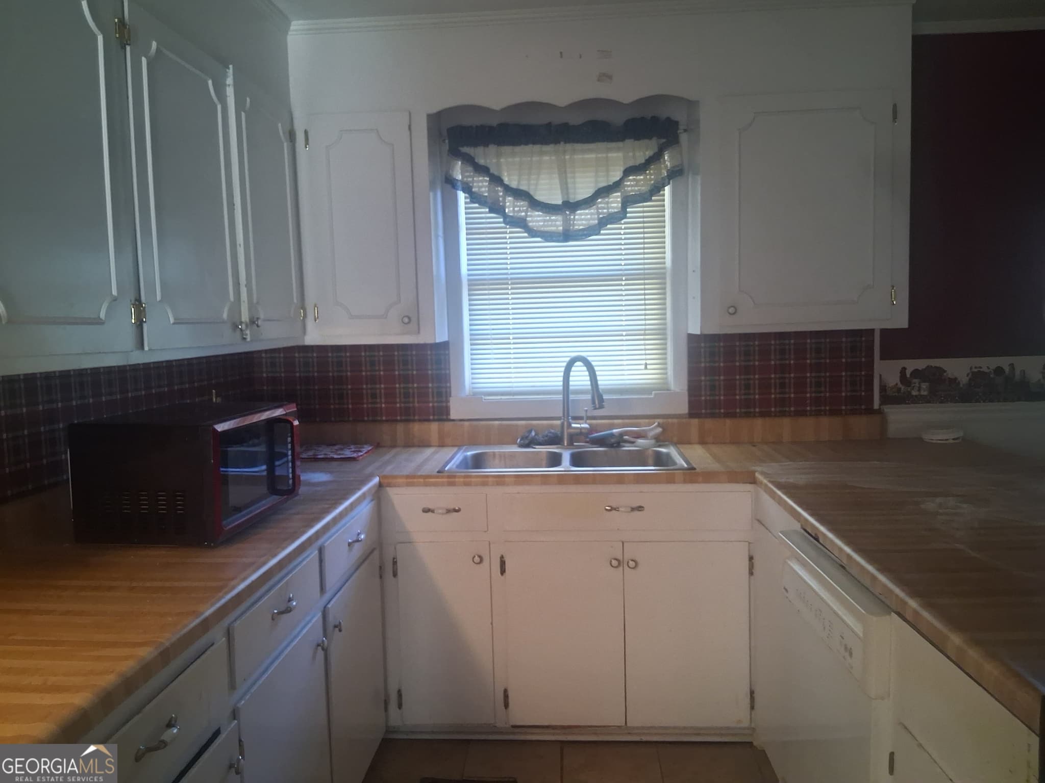 3 bedroom, 2 bathroom, 1,380 sq ft single family residence for sale at 5533 Russell Avenue, Eastman, GA 31023 — photo 6