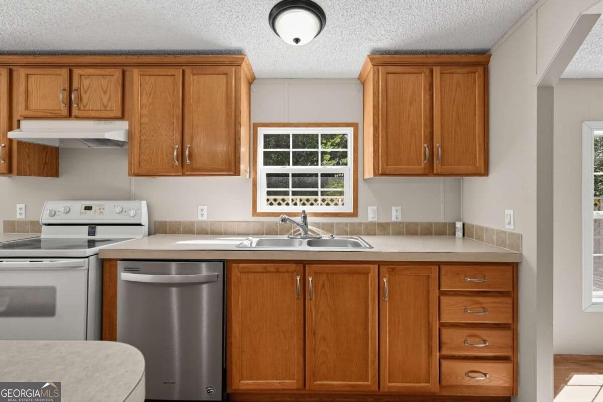 3 bedroom, 2 bathroom manufactured home,single family residence for sale at 194 Forge Mill Estates Drive, Morganton, GA 30560 — photo 6