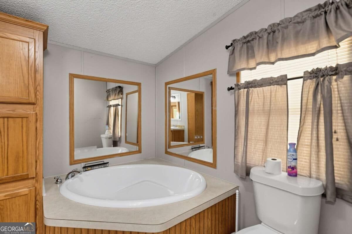 3 bedroom, 2 bathroom manufactured home,single family residence for sale at 194 Forge Mill Estates Drive, Morganton, GA 30560 — photo 10