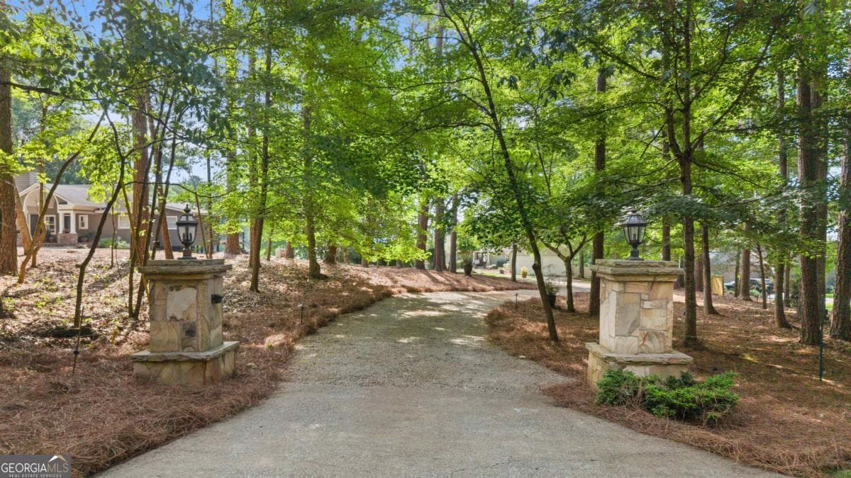 3 bedroom, 3.5 bathroom, 5,093 sq ft single family residence for sale at 1430 Buckhead Drive, Greensboro, GA 30642 — photo 2