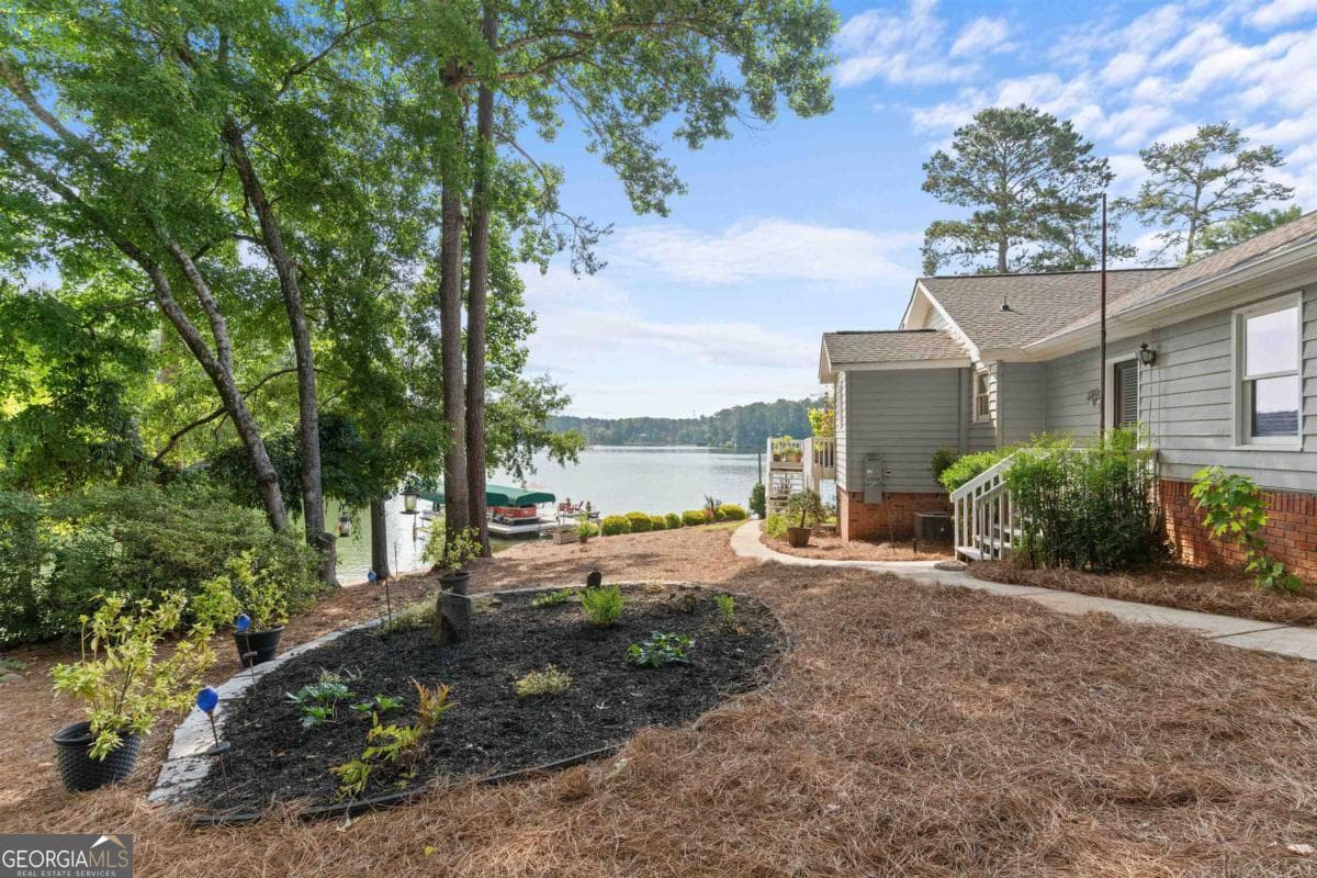 3 bedroom, 3.5 bathroom, 5,093 sq ft single family residence for sale at 1430 Buckhead Drive, Greensboro, GA 30642 — photo 4