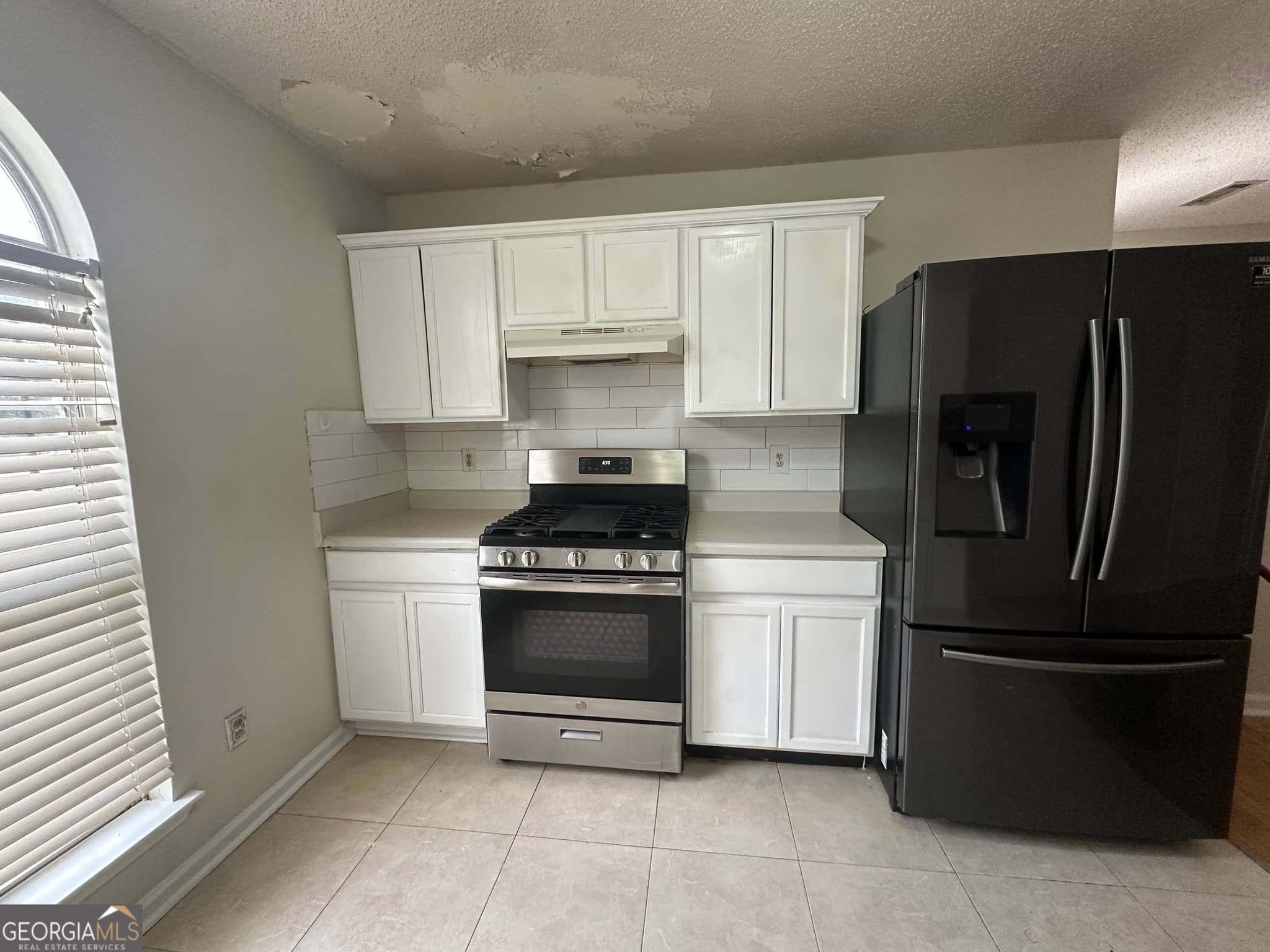3 bedroom, 2 bathroom, 1,315 sq ft single family residence for rent at 465 Eagles Crossing Circle, Riverdale, GA 30274 for $1,400 a month — photo 4