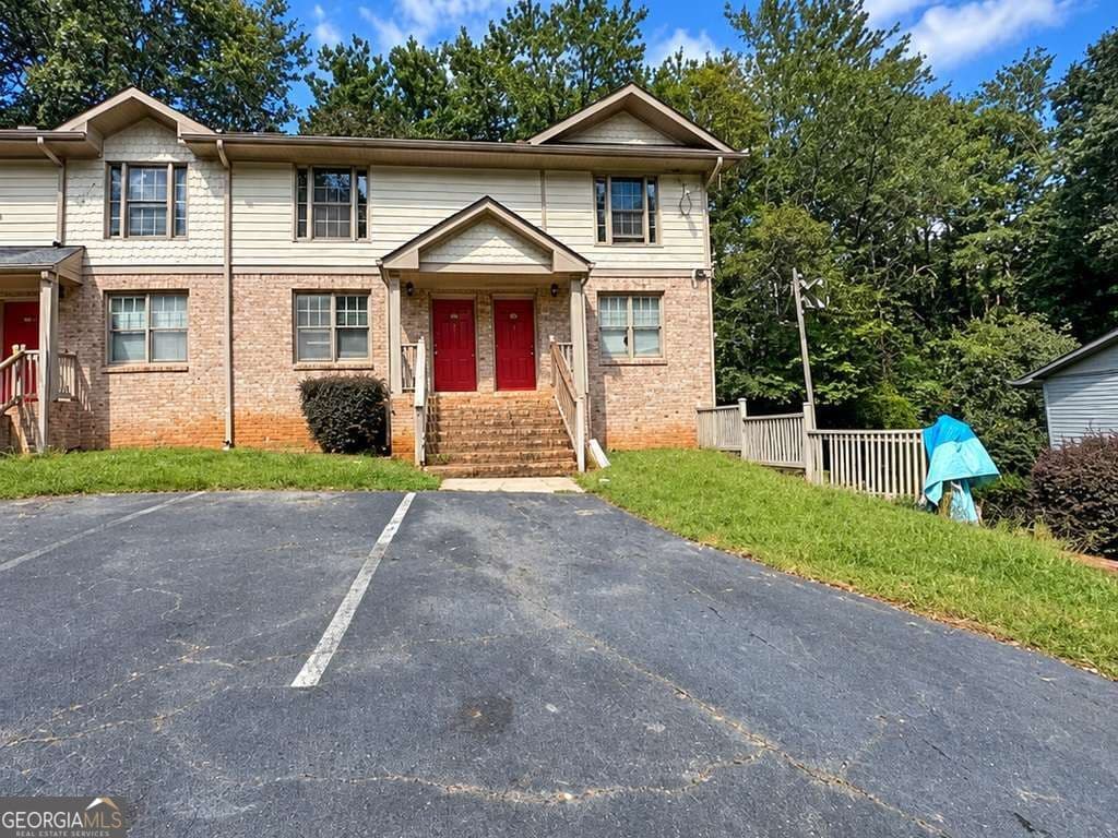 3 bedroom, 2.5 bathroom, 864 sq ft townhouse for sale at 1660 Stanton Road 1B, Atlanta, GA 30311 — photo 1 of 7
