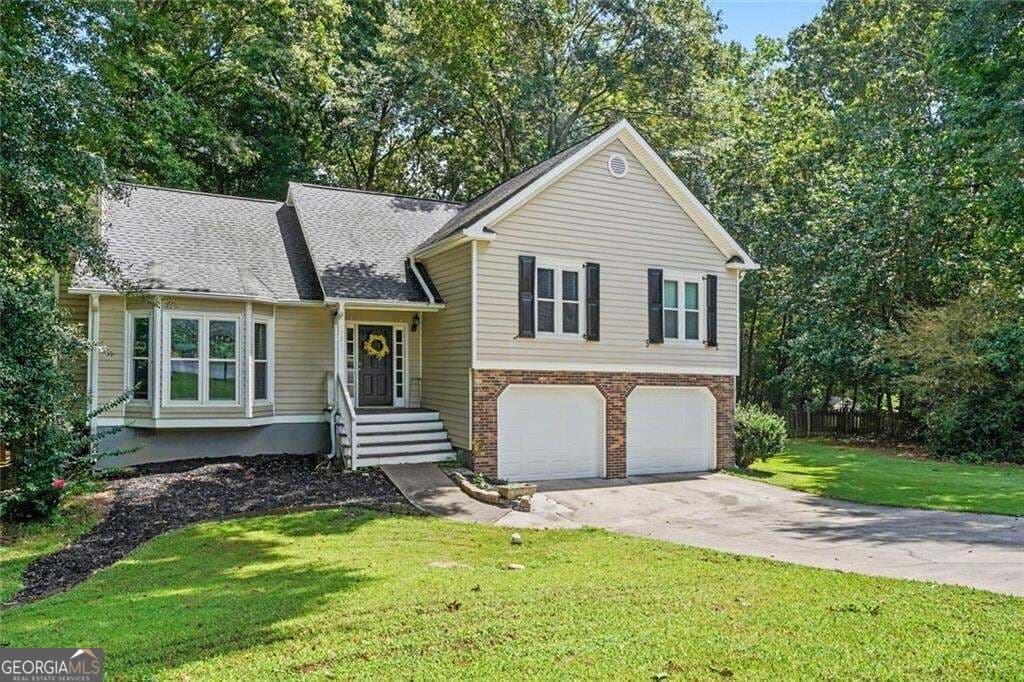 3 bedroom, 2.5 bathroom, 1,900 sq ft single family residence for sale at 996 Miles Court, Powder Springs, GA 30127 — photo 1 of 32