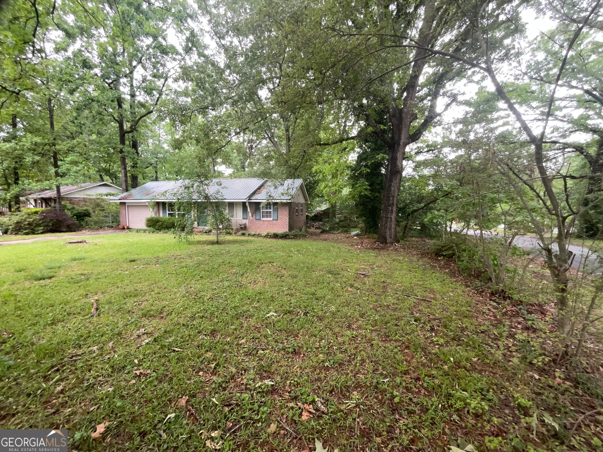 3 bedroom, 1 bathroom, 1,225 sq ft single family residence for sale at 62 Jonathan Road, Riverdale, GA 30274 — photo 2