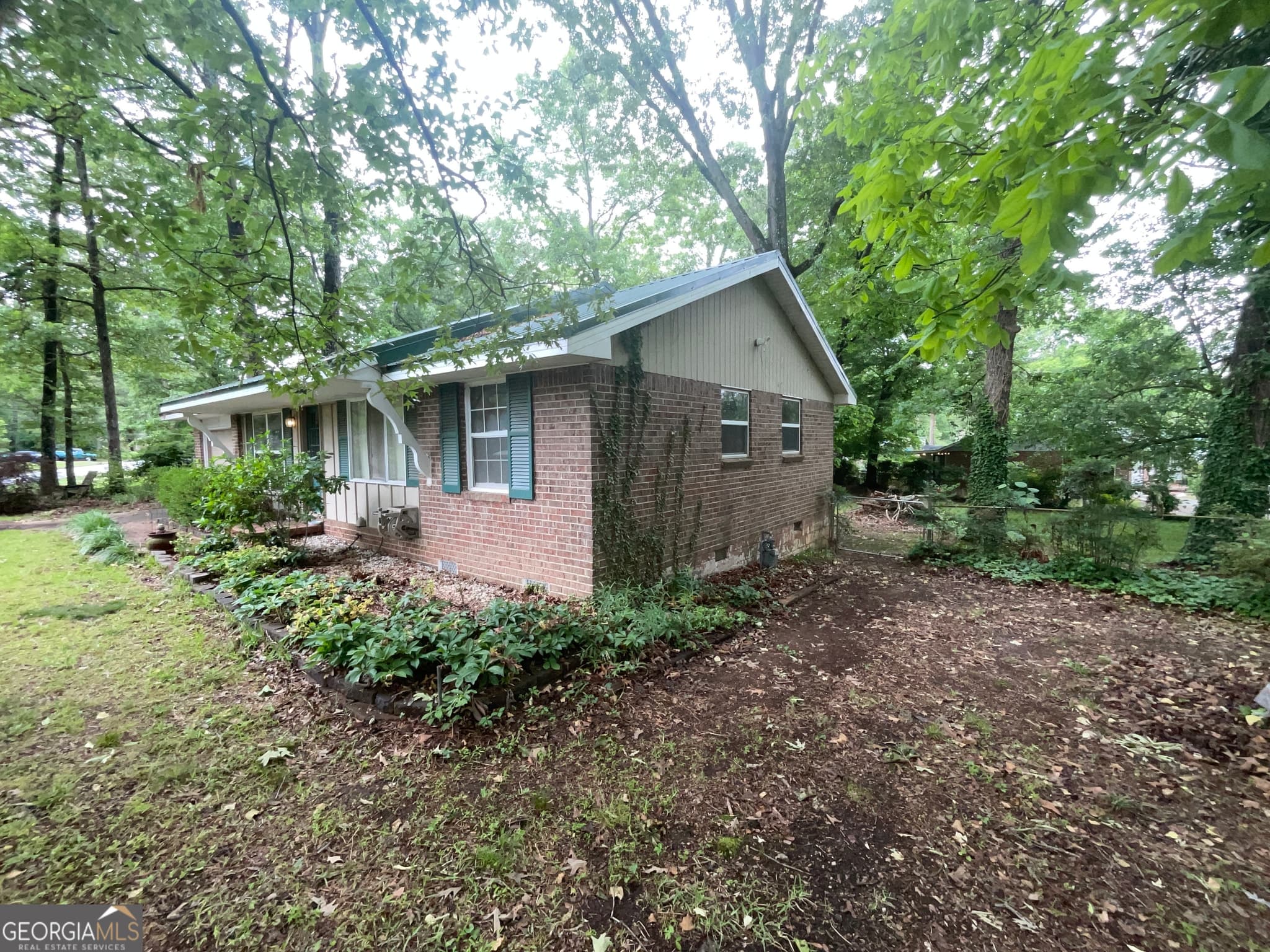 3 bedroom, 1 bathroom, 1,225 sq ft single family residence for sale at 62 Jonathan Road, Riverdale, GA 30274 — photo 3