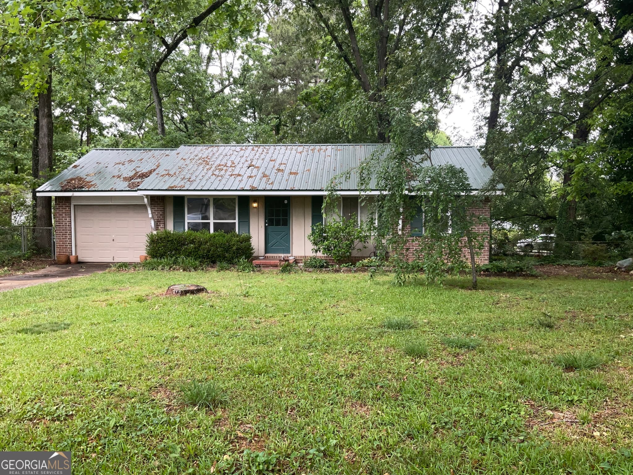 3 bedroom, 1 bathroom, 1,225 sq ft single family residence for sale at 62 Jonathan Road, Riverdale, GA 30274