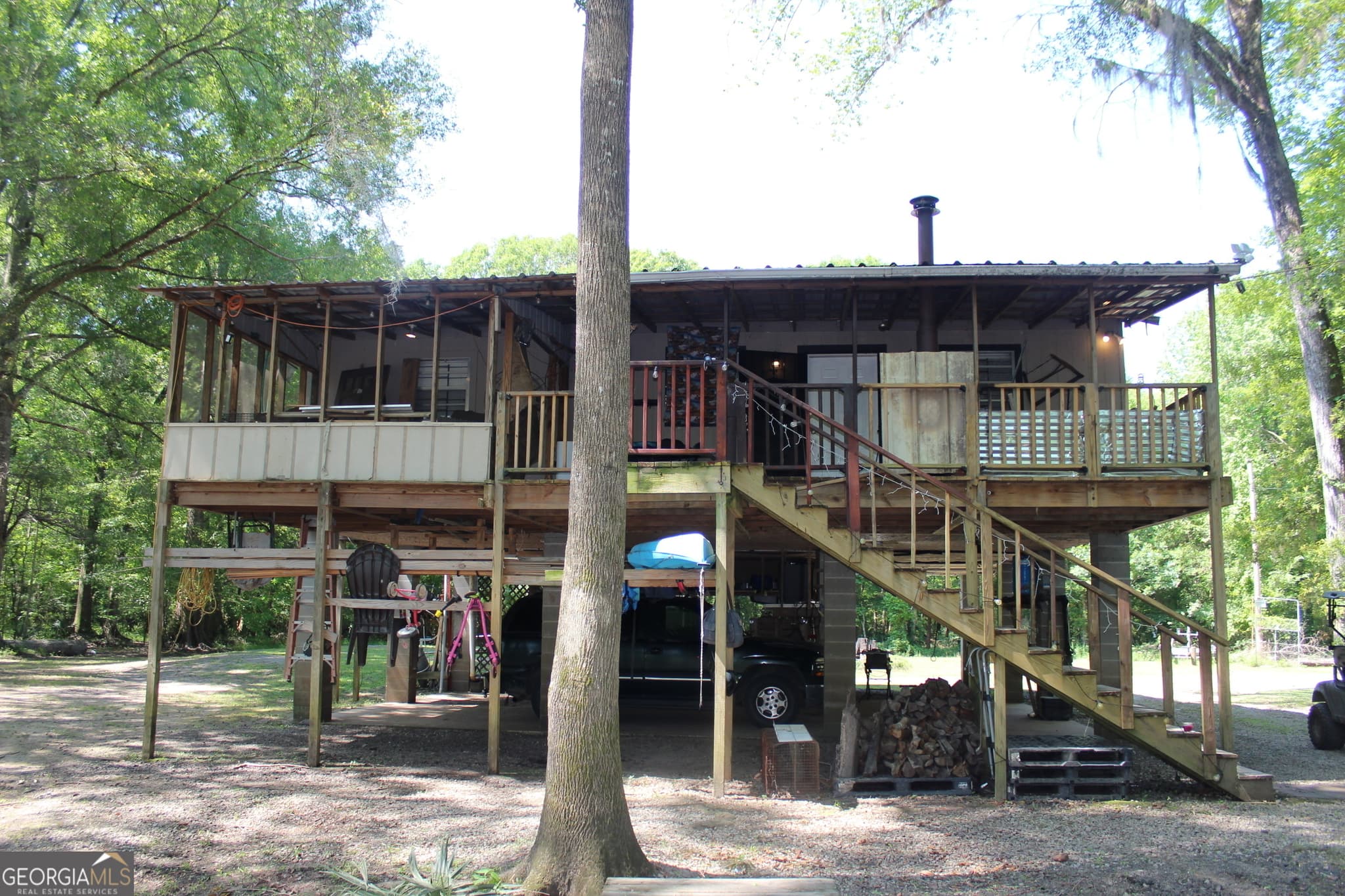 2 bedroom, 2 bathroom, 1,248 sq ft cabin,single family residence for sale at 67 Red Breast Lane, Statesboro, GA 30461 — photo 1 of 22