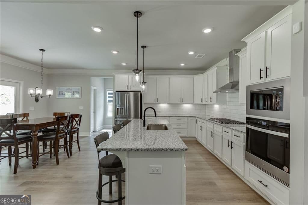 5 bedroom, 4 bathroom, 3,044 sq ft single family residence for sale at 265 Cherokee Rose Lane, Hoschton, GA 30548 — photo 9