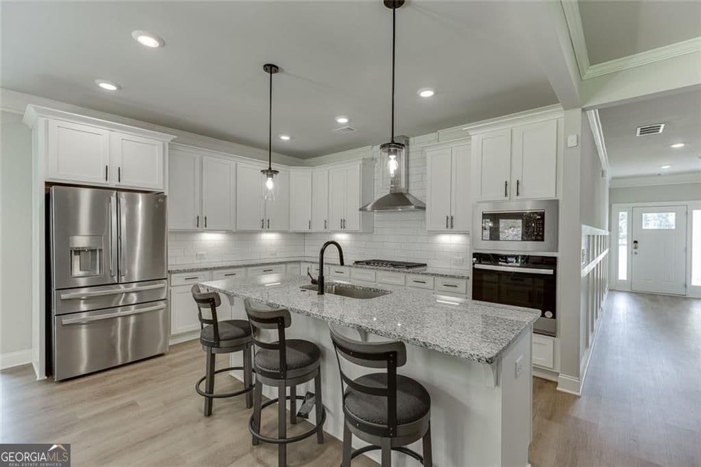 5 bedroom, 4 bathroom, 3,044 sq ft single family residence for sale at 265 Cherokee Rose Lane, Hoschton, GA 30548 — photo 10