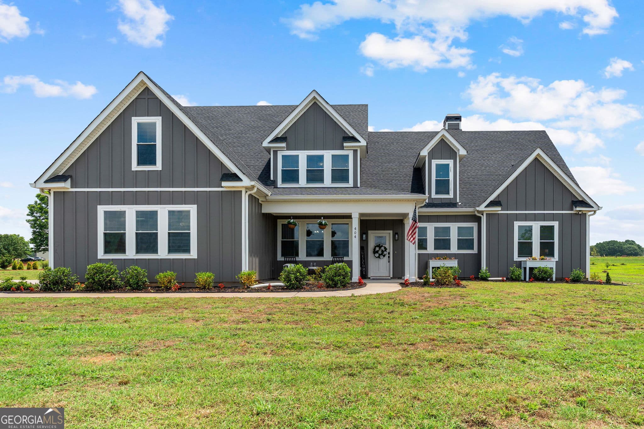 6 bedroom, 4.5 bathroom, 3,845 sq ft single family residence for sale at 404 Whipple Avenue, Williamson, GA 30292 — photo 1 of 103