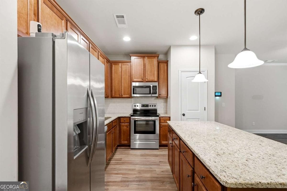 4 bedroom, 3 bathroom, 1,632 sq ft single family residence for sale at 213 Camellia Court LOT 51, Jackson, GA 30233 — photo 6